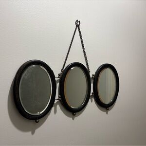 Antique wood trifold shaving mirror. Each oval mirror is 8” x 6”.
